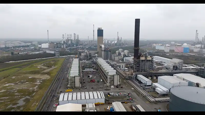Aerial drone survey photograph of industrial facility and surrounding infrastructure